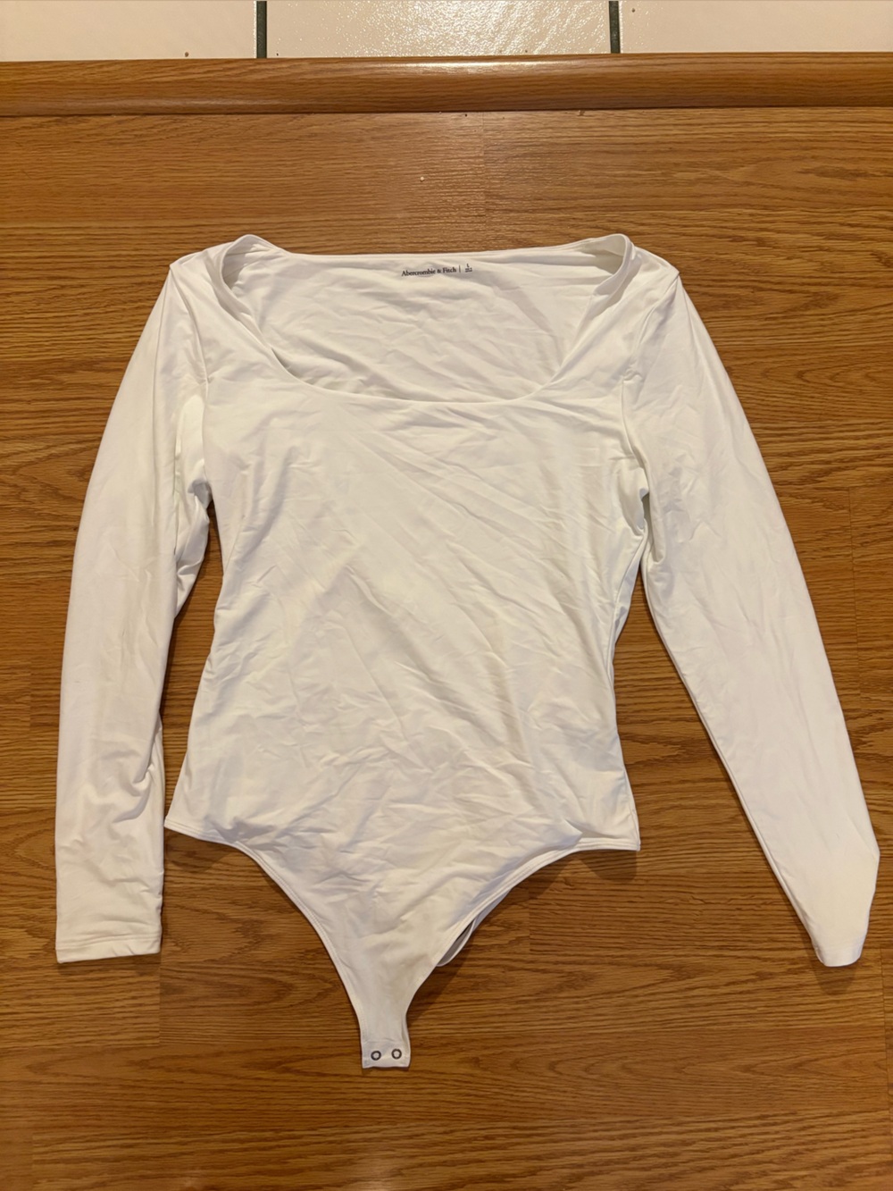 Abercrombie & Fitch White Long-Sleeve One-Piece Bodysuit